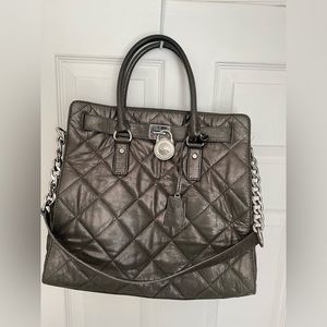 Michael Kors grey quilted Hamilton Lg w silver hardware . Great condition!